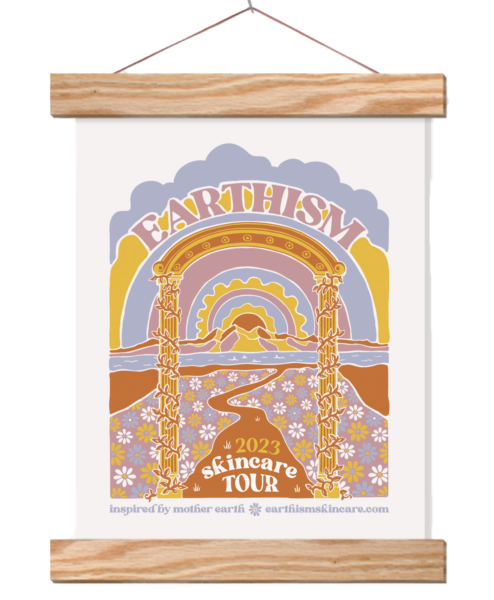 8" x 10" Canvas with Earthism graphic that says 2023 Skincare Tour. The graphic is a flowery landscape with a winding road through a vine covered column doorway leading to a sun and modern looking sky. The canvas is hung on thin wooden square dowels.
